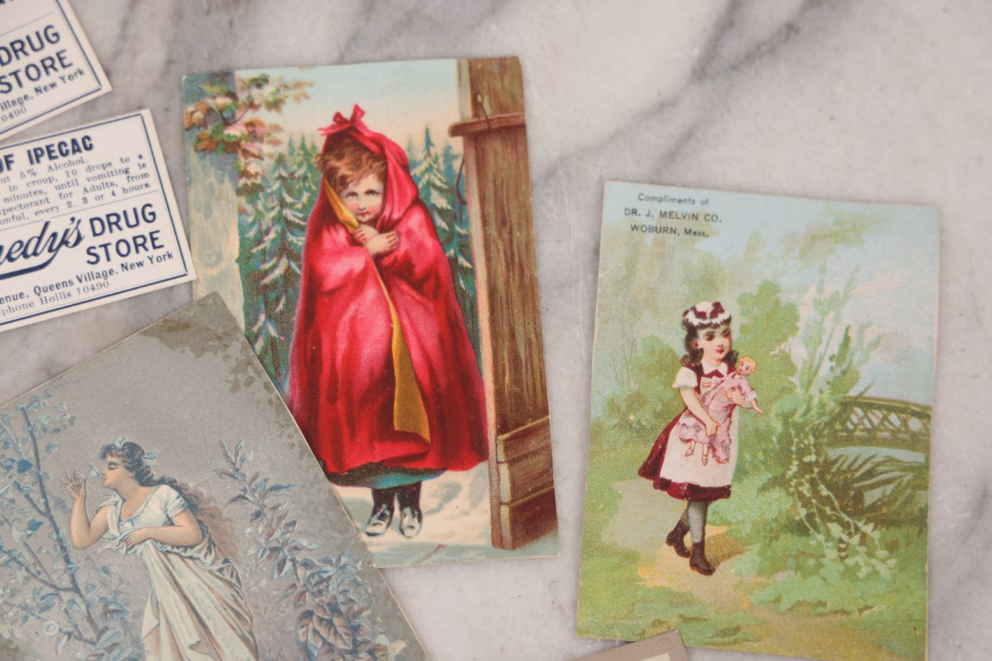 Lot 049 - Grouping Of Ten Antique Apothecary And Pharmacy Ephemera Items Including Carter's Iron Pills, Hood's Vegetable Pills, And Melvin's Cough Syrup And Other Trade Cards, With Four Unused Paper Labels