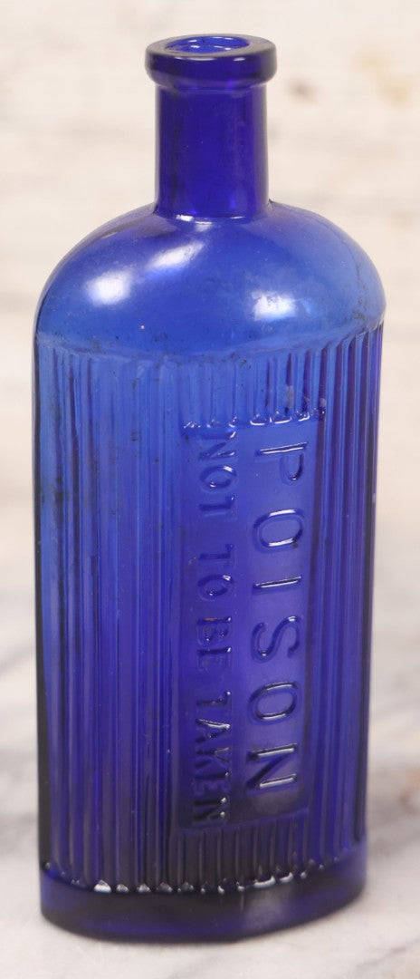 Lot 050 - Antique Cobalt Blue Glass Poison Bottle With Embossed Lettering, "Poison, Not To Be Taken," Vertical Poison Ribs, 6-5/8" H