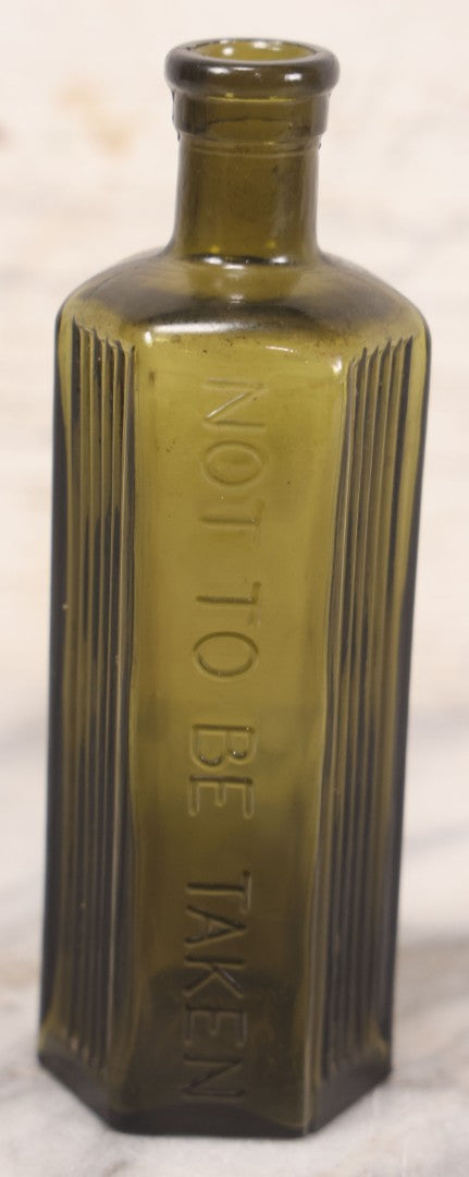 Lot 051 - Antique J. Lumb & Co. Ltd. Green Glass Poison Bottle With Embossed Lettering “Not To Be Taken,” Vertical Poison Ribs, 8 Oz. Size, Castleford, Yorkshire, England, Circa 1880s, 6-5/8" H