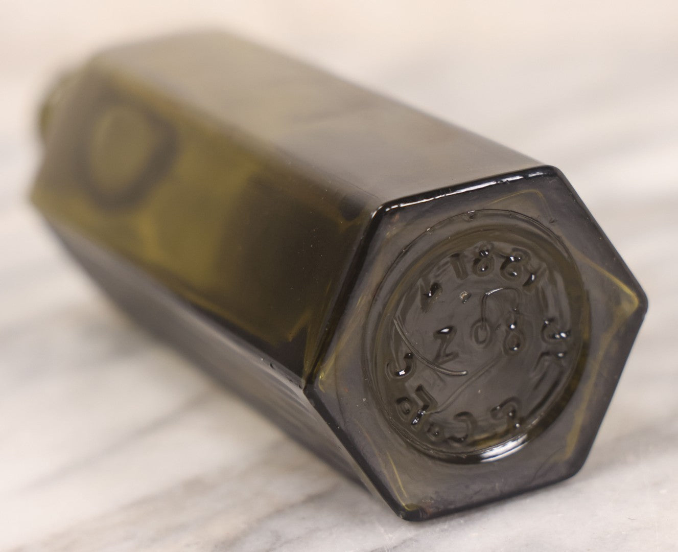 Lot 051 - Antique J. Lumb & Co. Ltd. Green Glass Poison Bottle With Embossed Lettering “Not To Be Taken,” Vertical Poison Ribs, 8 Oz. Size, Castleford, Yorkshire, England, Circa 1880s, 6-5/8" H