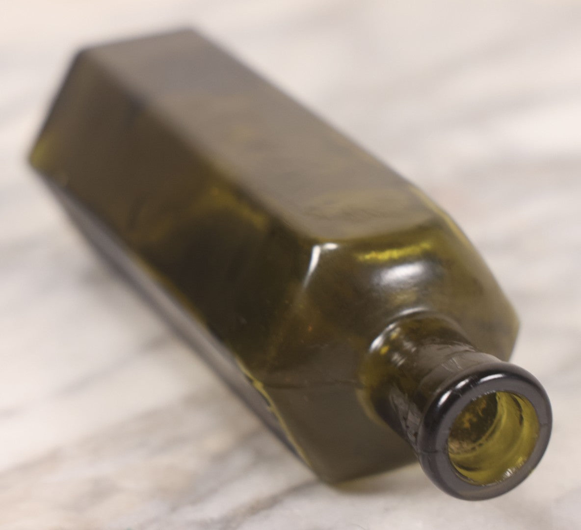 Lot 051 - Antique J. Lumb & Co. Ltd. Green Glass Poison Bottle With Embossed Lettering “Not To Be Taken,” Vertical Poison Ribs, 8 Oz. Size, Castleford, Yorkshire, England, Circa 1880s, 6-5/8" H