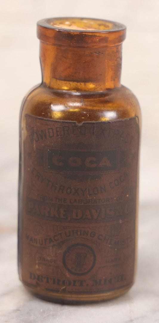 Lot 052 - Antique Parke, Davis & Co. “Erythroxylon Coca” Powdered Extract Amber Glass Bottle With Original Paper Label And Contents, Detroit, Michigan, 3-1/2" H