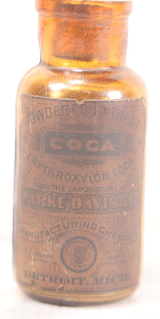 Lot 052 - Antique Parke, Davis & Co. “Erythroxylon Coca” Powdered Extract Amber Glass Bottle With Original Paper Label And Contents, Detroit, Michigan, 3-1/2" H