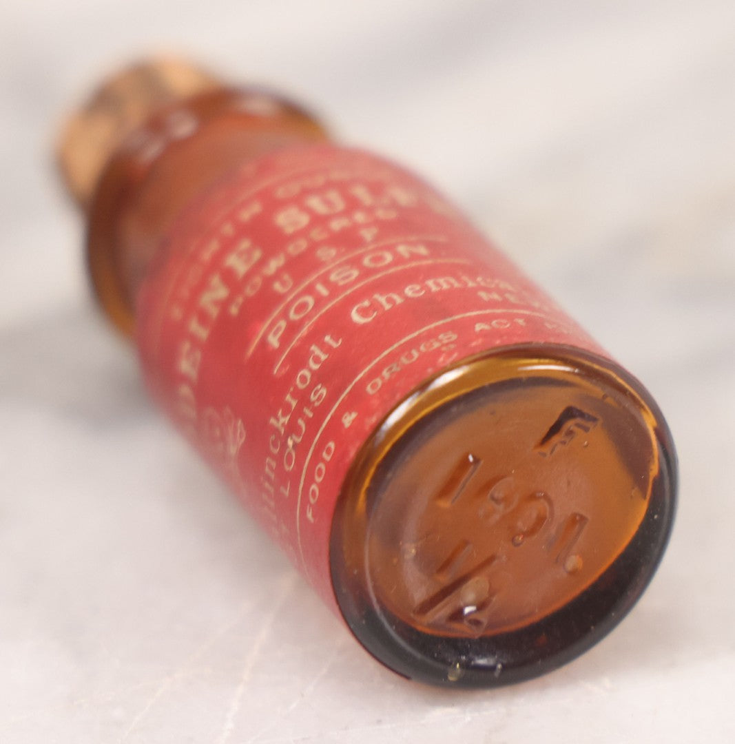Lot 053 - Antique Mallinckrodt Chemical Works “Codeine Sulfate” Powder U.S.P. Amber Glass Bottle With Red Poison Label Featuring Skull And Crossbones, 1/8 Oz. Size, St. Louis & New York, Marked Food And Drugs Act 1906, 2-5/8" H