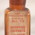 Lot 054 - Antique Parke, Davis & Co. “Morphine Sulfate" Amber Glass Bottle, "100 Hypodermic Tablets, No. 13, 1/4 Grain, Poison," Detroit, Michigan, 2-1/4" H