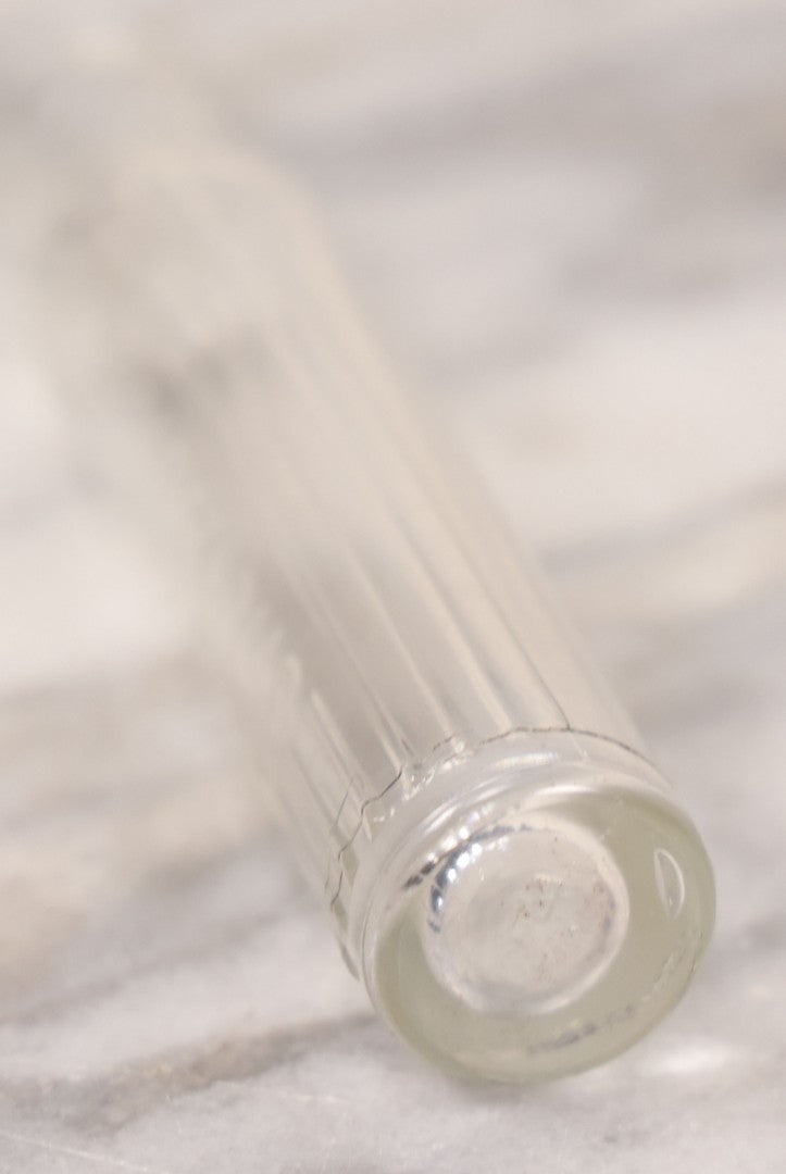 Lot 055 - Antique Narrow Clear Glass Poison Bottle With Embossed Lettering “Poisonous,” Vertical Poison Ribs, 4-1/2" H