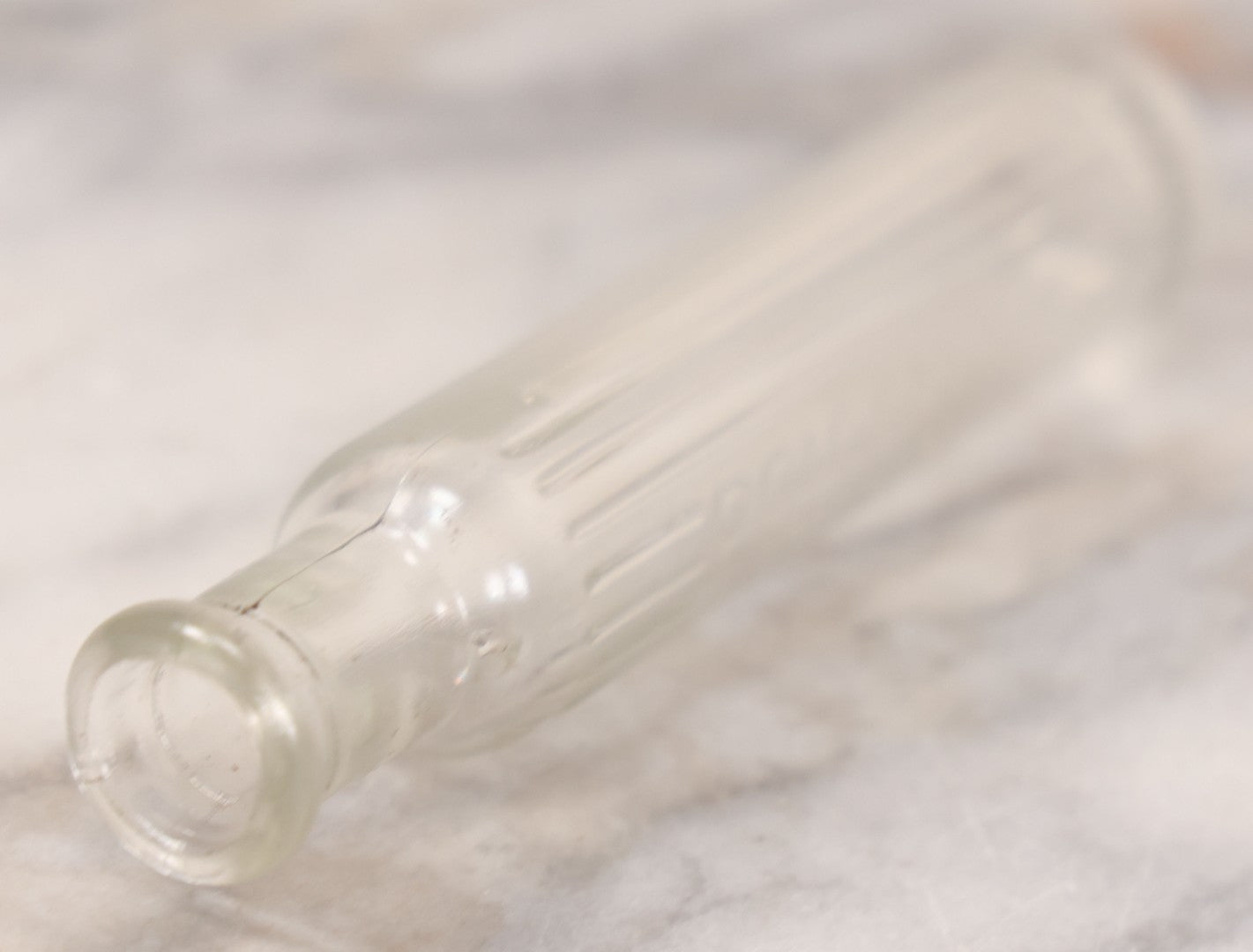 Lot 055 - Antique Narrow Clear Glass Poison Bottle With Embossed Lettering “Poisonous,” Vertical Poison Ribs, 4-1/2" H