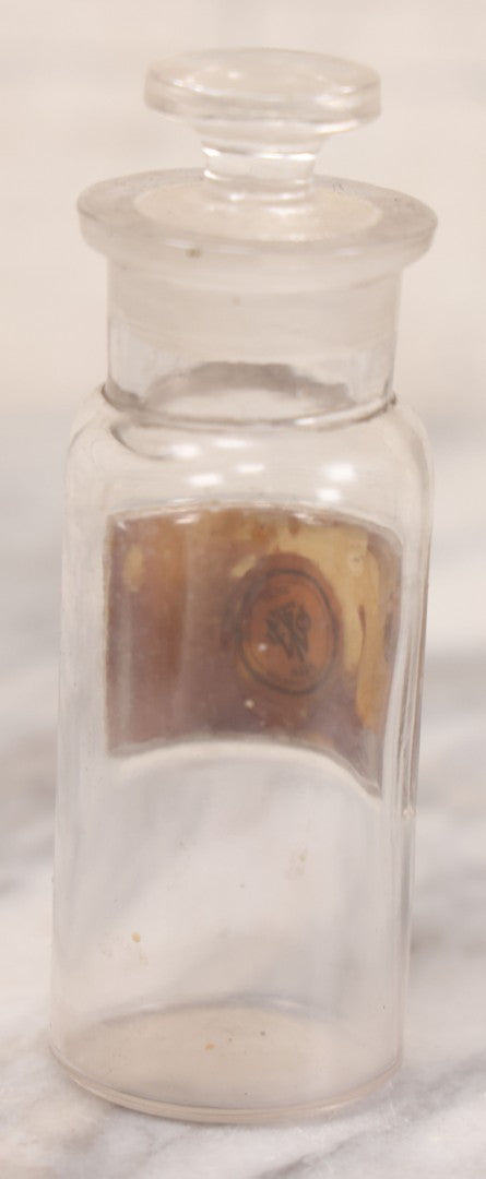 Lot 056 - Antique Whitall Tatum Co. Clear Glass Apothecary Bottle With Stopper And Reverse Painted Label “Antikam.” (Antikamnia), Small Size, 4-3/8" H