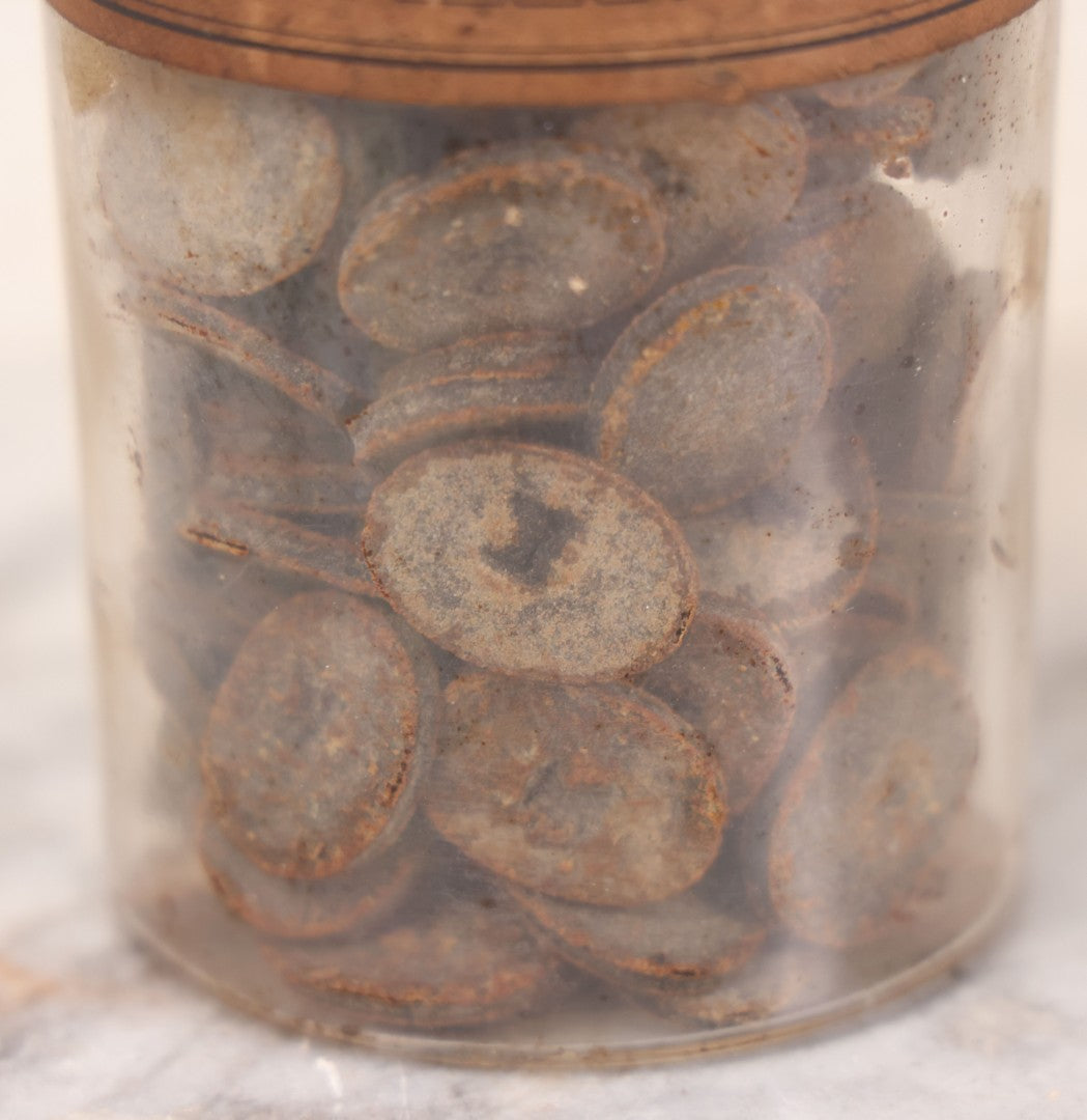 Lot 058 - Antique Apothecary Bottle With Original Paper Label “Kino, London Hospital Throat Lozenges” With Contents, Clear Glass Bottle With Stopper Manufactured By George C. Frye, Portland, Maine, 8" H