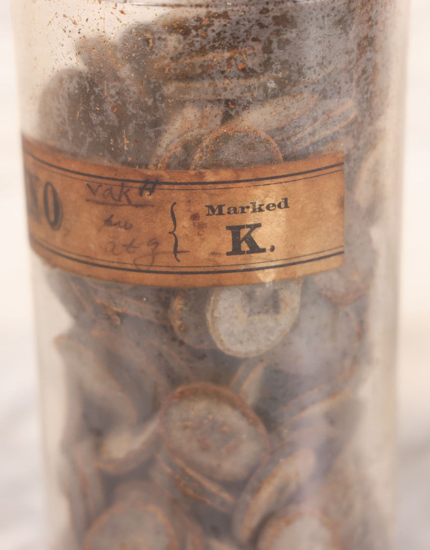 Lot 058 - Antique Apothecary Bottle With Original Paper Label “Kino, London Hospital Throat Lozenges” With Contents, Clear Glass Bottle With Stopper Manufactured By George C. Frye, Portland, Maine, 8" H