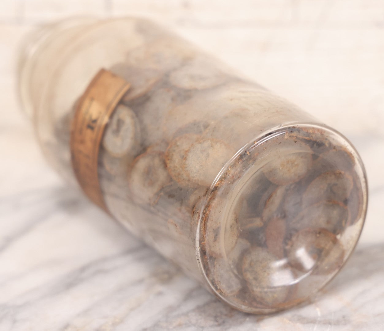 Lot 058 - Antique Apothecary Bottle With Original Paper Label “Kino, London Hospital Throat Lozenges” With Contents, Clear Glass Bottle With Stopper Manufactured By George C. Frye, Portland, Maine, 8" H