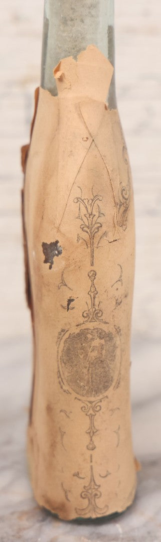 Lot 059 - Antique Ayer's Clear Glass Bottle With Partial Paper Label Wrapper And Embossed Base, 7-1/2" H
