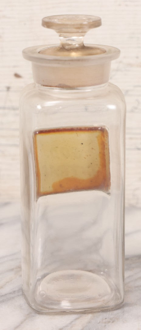 Lot 061 - Antique Whitall Tatum Co. Clear Glass Apothecary Bottle With Stopper And Reverse Painted Label “Sod. Citras”, 7-3/4" H