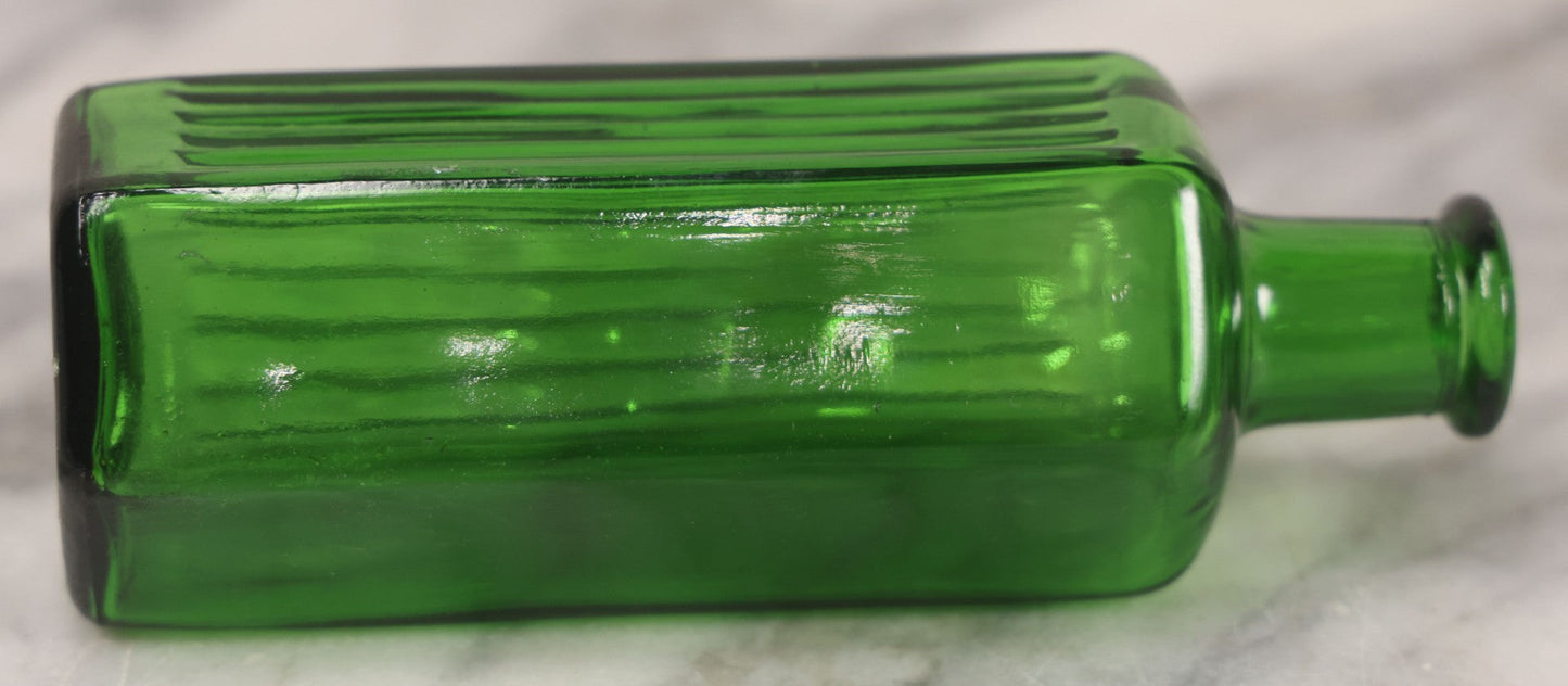 Lot 063 - Pair Of Antique Green Glass Poison Bottles With Embossed Lettering “Not To Be Taken,” Vertical Poison Ribs, Including Hexagonal 8Oz And Rectangular 4 Oz Sizes