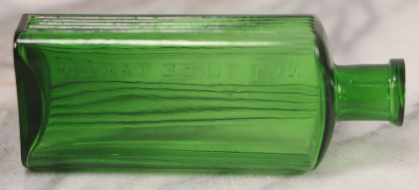 Lot 063 - Pair Of Antique Green Glass Poison Bottles With Embossed Lettering “Not To Be Taken,” Vertical Poison Ribs, Including Hexagonal 8Oz And Rectangular 4 Oz Sizes