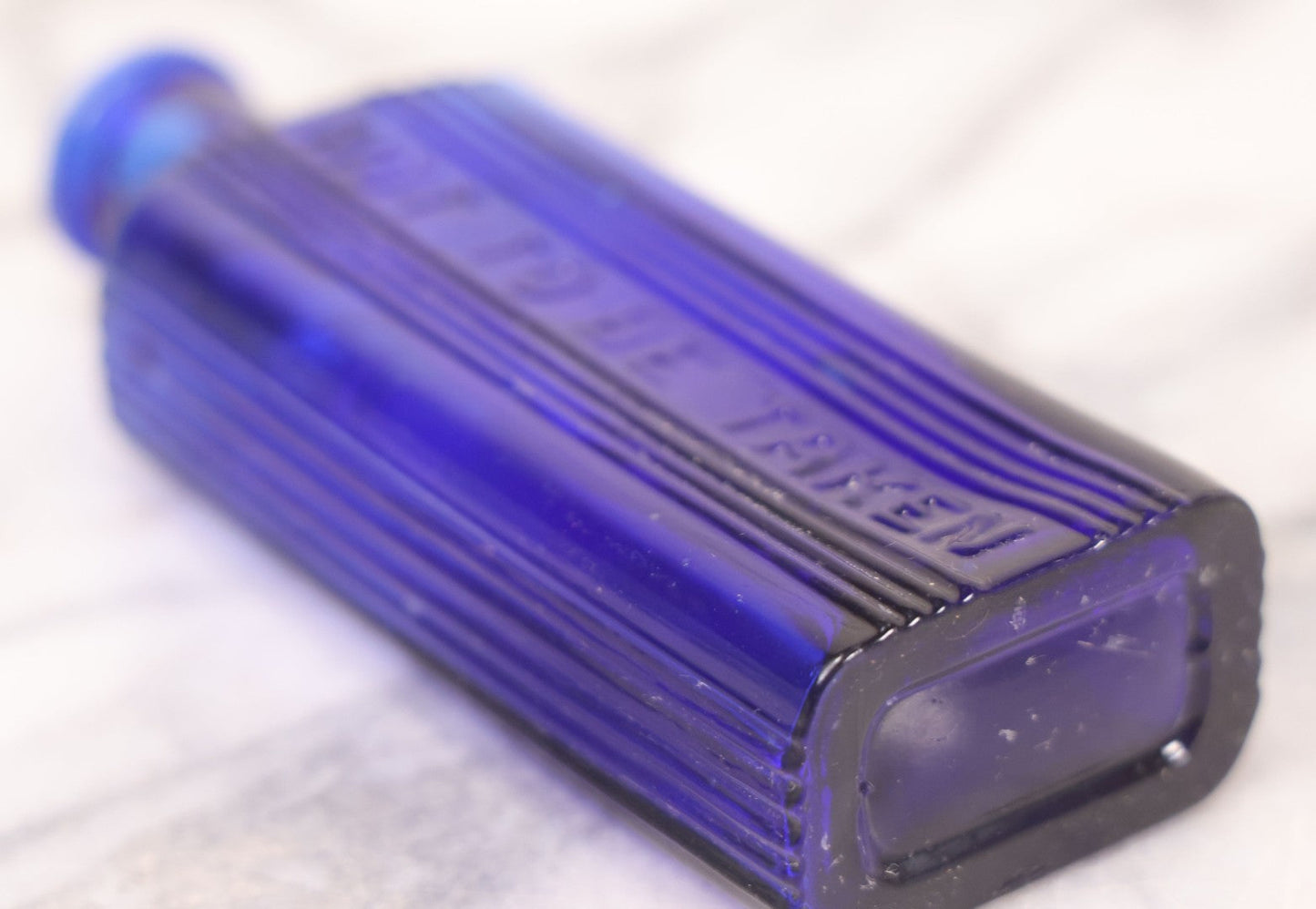 Lot 064 - Grouping Of Three Antique Cobalt Blue Glass Poison Bottles With Embossed Lettering “Not To Be Taken,” Rectangular Form With Vertical Poison Ribs, Three Sizes