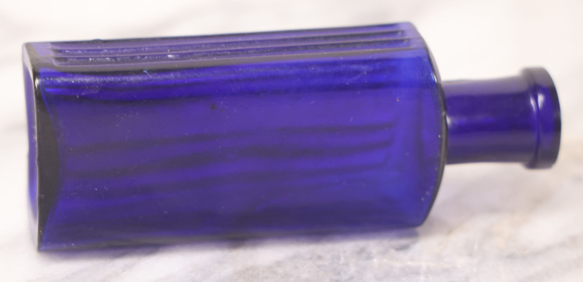 Lot 064 - Grouping Of Three Antique Cobalt Blue Glass Poison Bottles With Embossed Lettering “Not To Be Taken,” Rectangular Form With Vertical Poison Ribs, Three Sizes