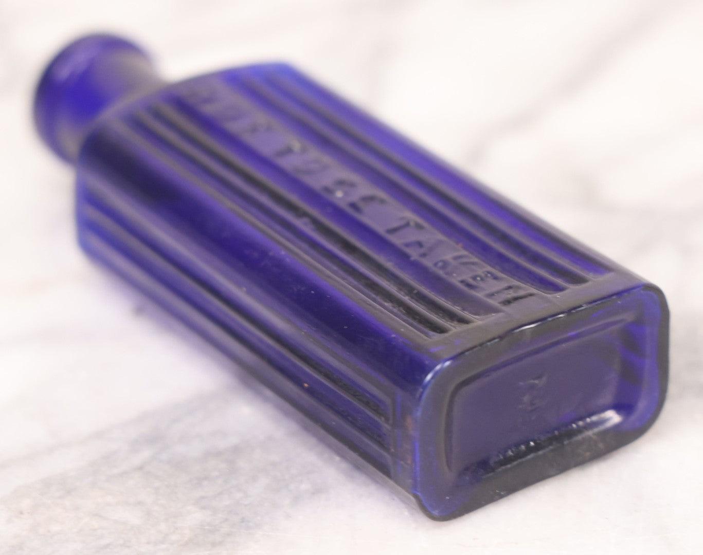 Lot 064 - Grouping Of Three Antique Cobalt Blue Glass Poison Bottles With Embossed Lettering “Not To Be Taken,” Rectangular Form With Vertical Poison Ribs, Three Sizes