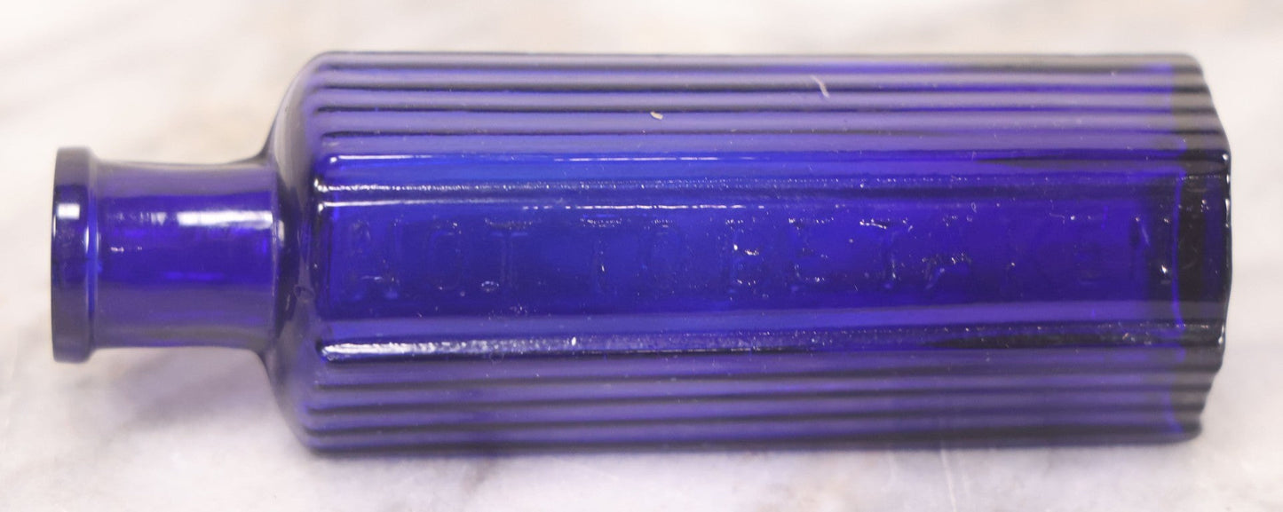 Lot 065 - Grouping Of Three Antique Cobalt Blue Glass Poison Bottles With Embossed Lettering “Not To Be Taken,” Hexagonal Form With Vertical Poison Ribs, Two 2Oz And One 3Oz, 3Oz Marked Y.C. Co.