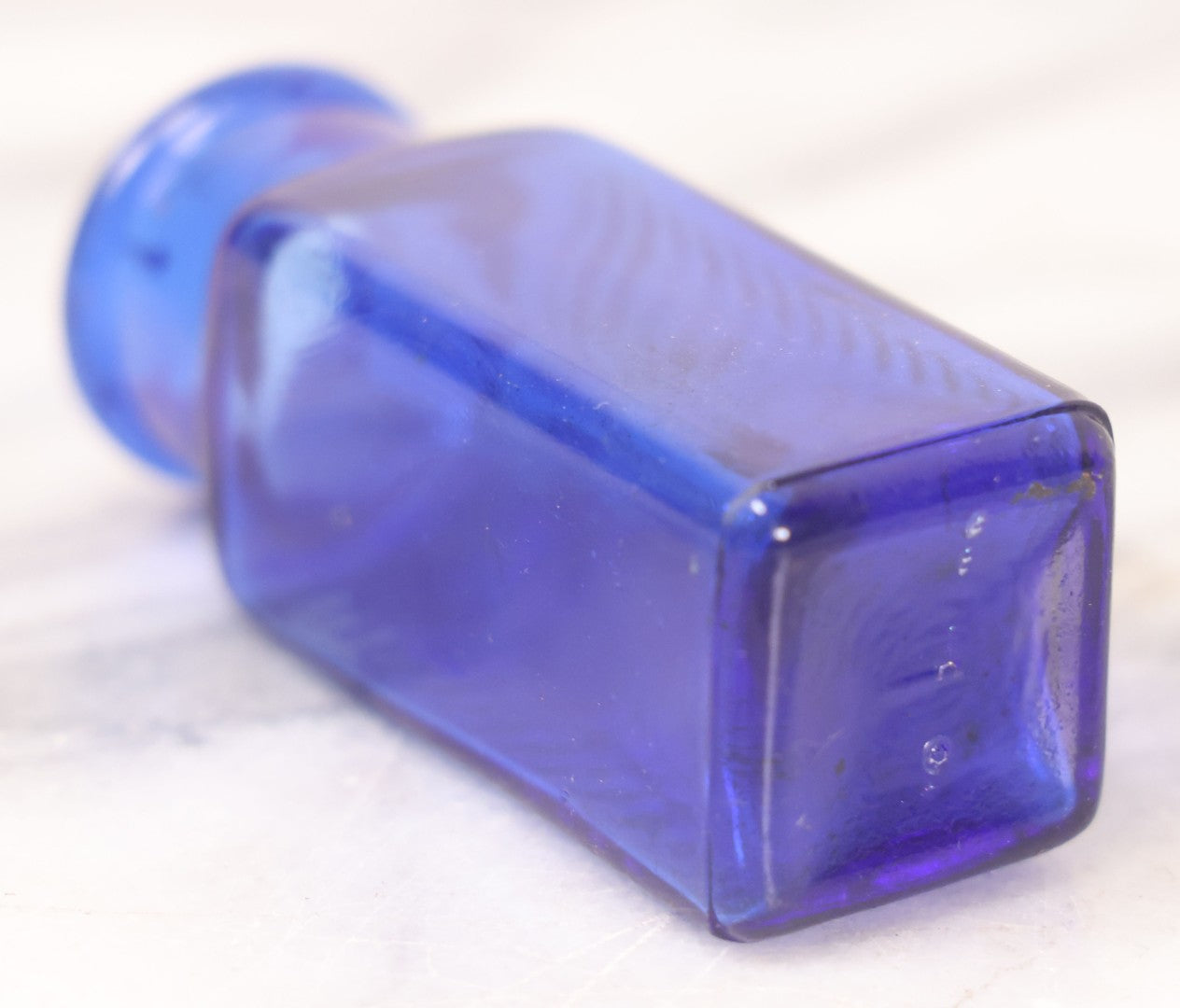 Lot 066 - Grouping Of Three Antique Cobalt Blue Glass Poison Bottles, Including Embossed “Poison” With Horizontal Ribs, Embossed “Wyeth Poison” Without Ribs, And Whitall Tatum Co. Bottle With Partial Paper Label