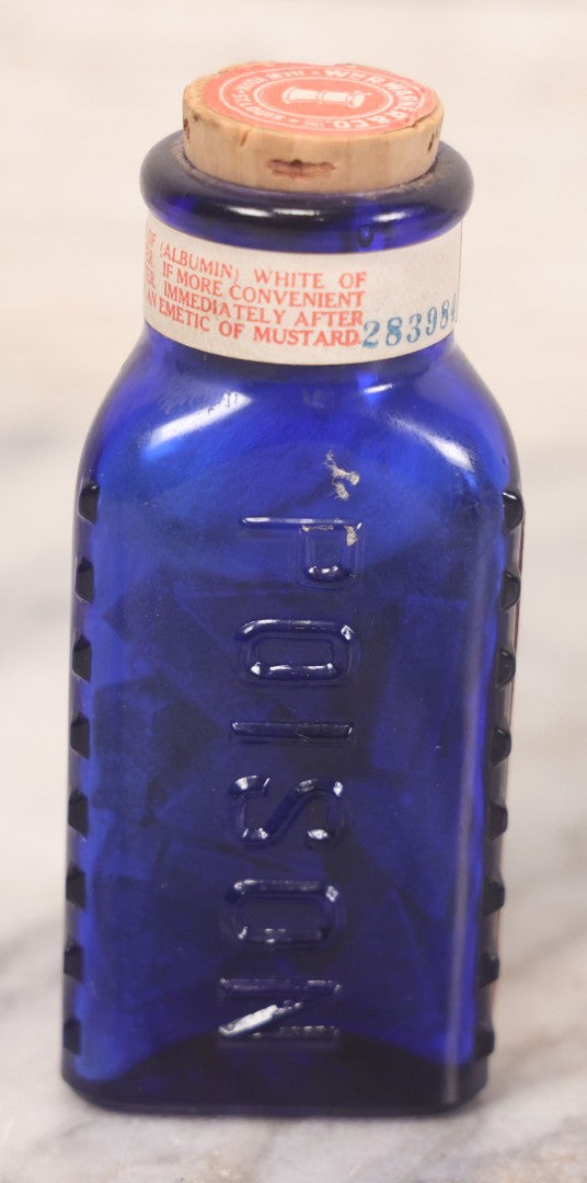 Lot 067 - Grouping Of Three Antique Small Cobalt Blue Glass Poison Bottles, Including Crosshatch Poison Ribbed And Two Triangular “Antiseptic Triloids” Bottles By William R. Warner & Co. Inc., New York & St. Louis, With Paper Labels