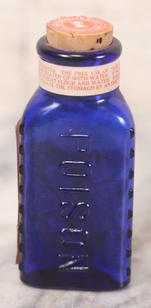 Lot 067 - Grouping Of Three Antique Small Cobalt Blue Glass Poison Bottles, Including Crosshatch Poison Ribbed And Two Triangular “Antiseptic Triloids” Bottles By William R. Warner & Co. Inc., New York & St. Louis, With Paper Labels