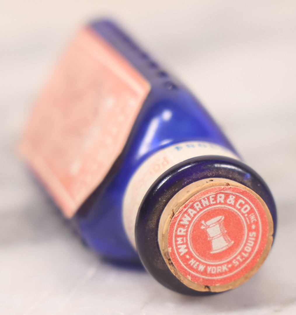 Lot 067 - Grouping Of Three Antique Small Cobalt Blue Glass Poison Bottles, Including Crosshatch Poison Ribbed And Two Triangular “Antiseptic Triloids” Bottles By William R. Warner & Co. Inc., New York & St. Louis, With Paper Labels
