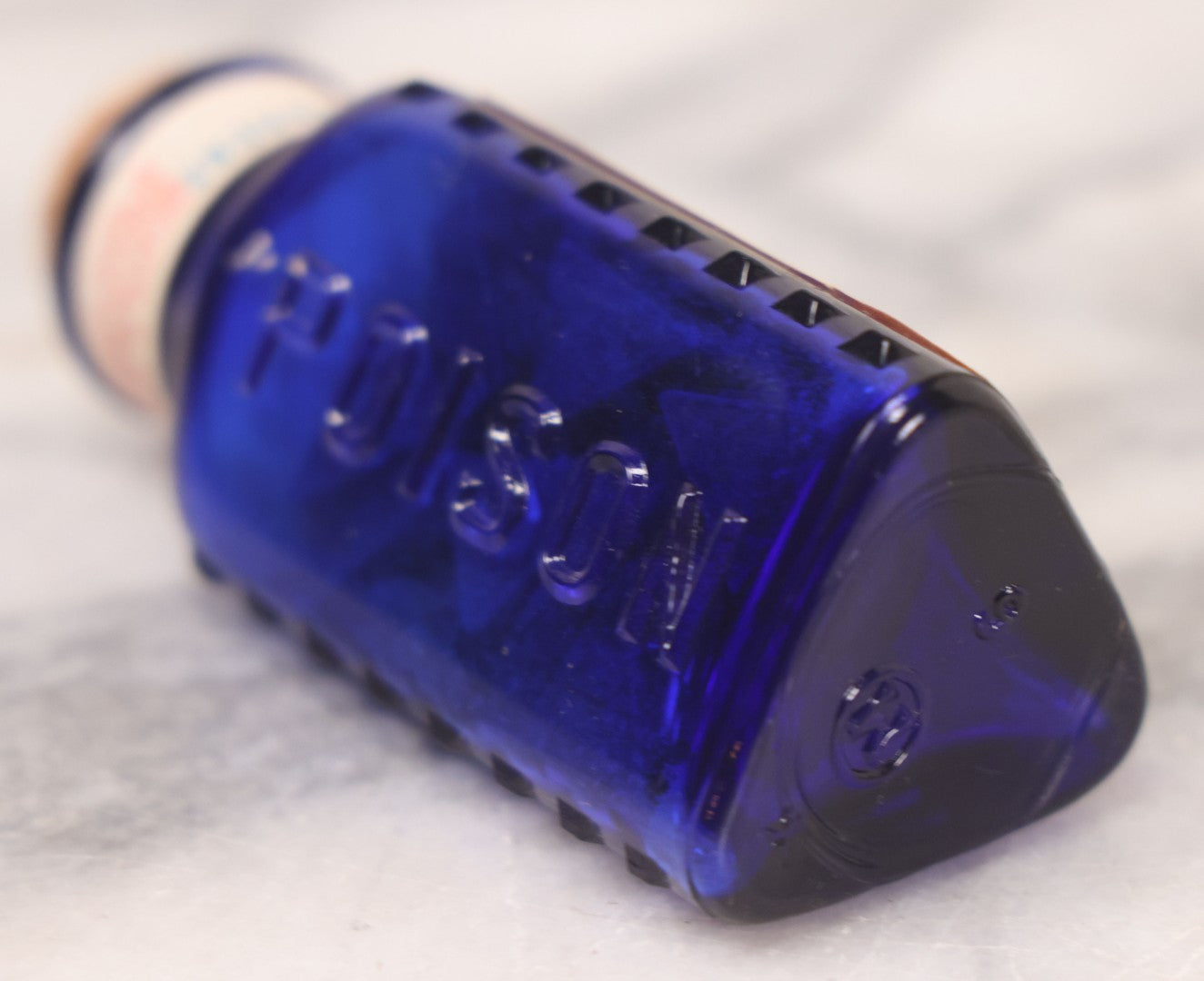 Lot 067 - Grouping Of Three Antique Small Cobalt Blue Glass Poison Bottles, Including Crosshatch Poison Ribbed And Two Triangular “Antiseptic Triloids” Bottles By William R. Warner & Co. Inc., New York & St. Louis, With Paper Labels