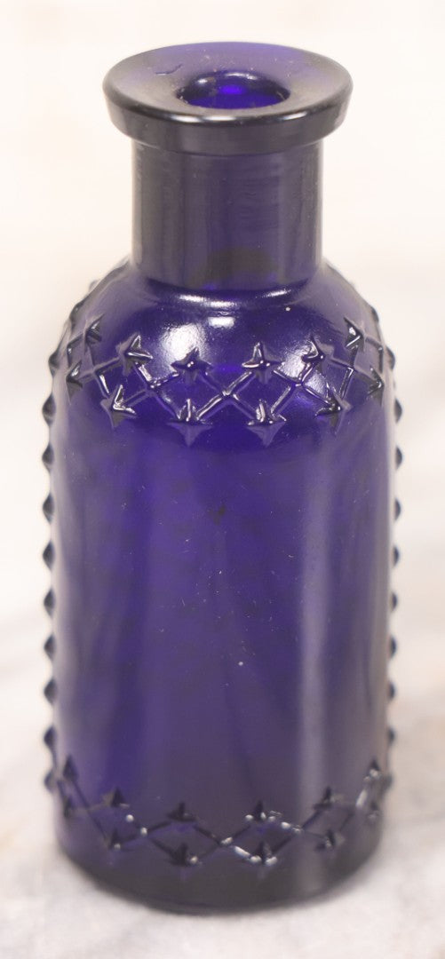 Lot 067 - Grouping Of Three Antique Small Cobalt Blue Glass Poison Bottles, Including Crosshatch Poison Ribbed And Two Triangular “Antiseptic Triloids” Bottles By William R. Warner & Co. Inc., New York & St. Louis, With Paper Labels