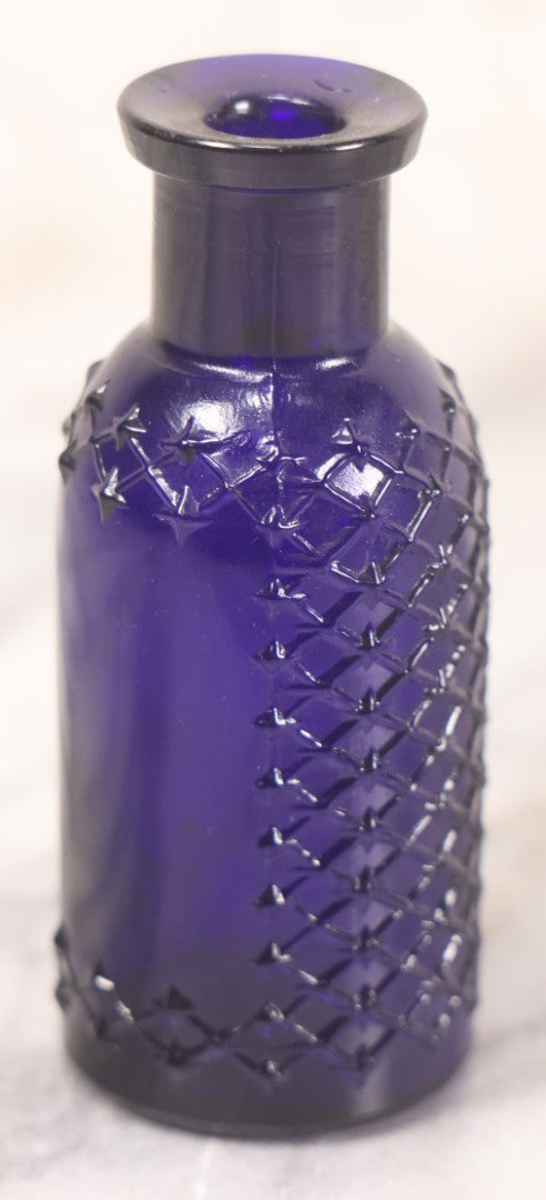 Lot 067 - Grouping Of Three Antique Small Cobalt Blue Glass Poison Bottles, Including Crosshatch Poison Ribbed And Two Triangular “Antiseptic Triloids” Bottles By William R. Warner & Co. Inc., New York & St. Louis, With Paper Labels