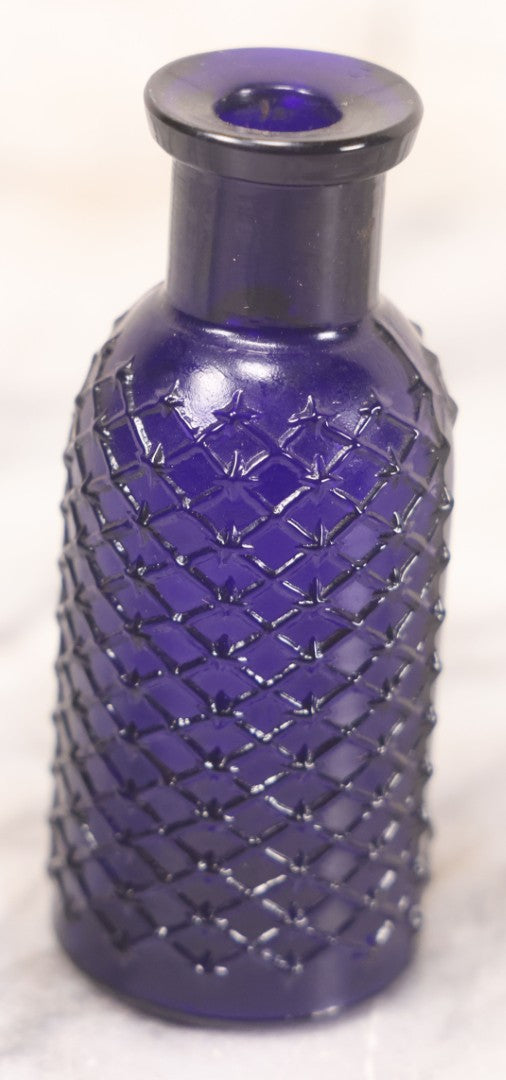 Lot 067 - Grouping Of Three Antique Small Cobalt Blue Glass Poison Bottles, Including Crosshatch Poison Ribbed And Two Triangular “Antiseptic Triloids” Bottles By William R. Warner & Co. Inc., New York & St. Louis, With Paper Labels