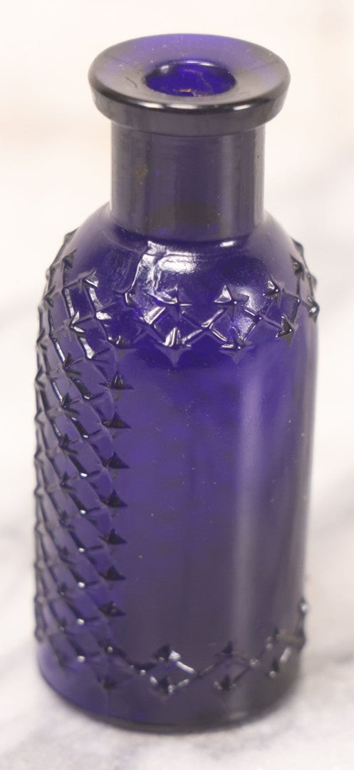 Lot 067 - Grouping Of Three Antique Small Cobalt Blue Glass Poison Bottles, Including Crosshatch Poison Ribbed And Two Triangular “Antiseptic Triloids” Bottles By William R. Warner & Co. Inc., New York & St. Louis, With Paper Labels