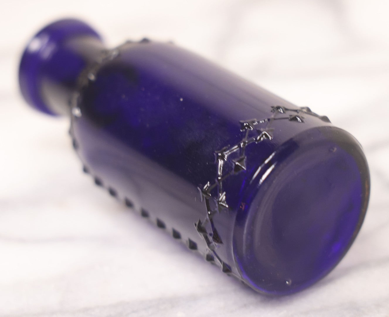 Lot 067 - Grouping Of Three Antique Small Cobalt Blue Glass Poison Bottles, Including Crosshatch Poison Ribbed And Two Triangular “Antiseptic Triloids” Bottles By William R. Warner & Co. Inc., New York & St. Louis, With Paper Labels