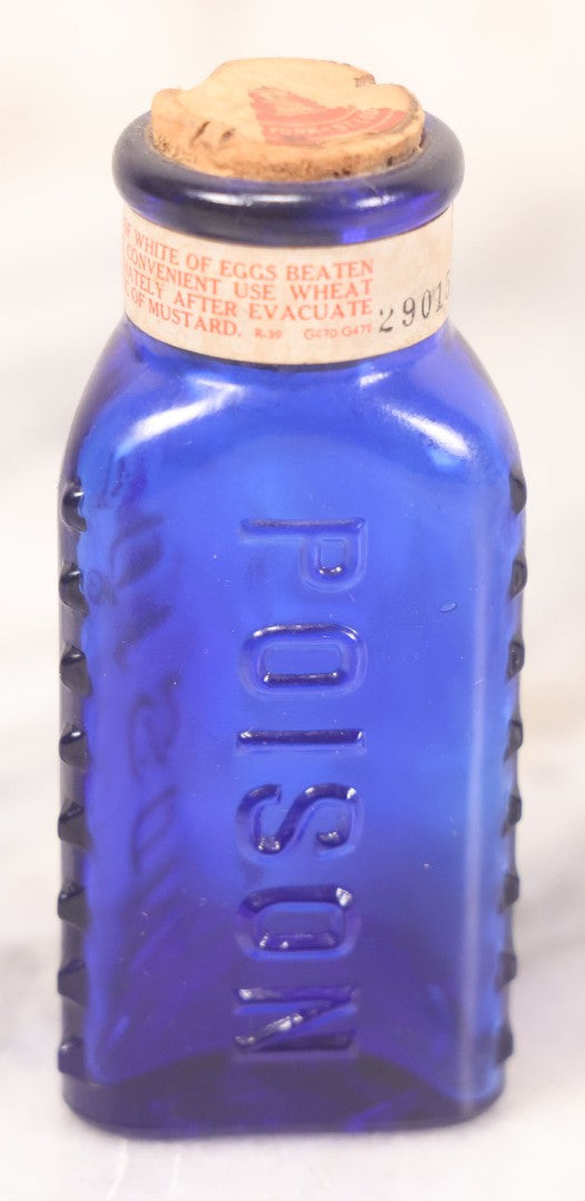 Lot 067 - Grouping Of Three Antique Small Cobalt Blue Glass Poison Bottles, Including Crosshatch Poison Ribbed And Two Triangular “Antiseptic Triloids” Bottles By William R. Warner & Co. Inc., New York & St. Louis, With Paper Labels