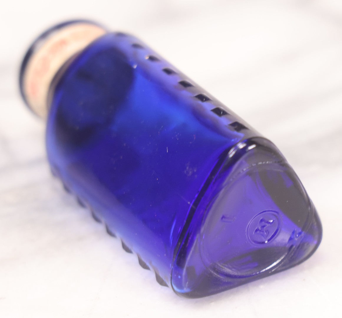 Lot 067 - Grouping Of Three Antique Small Cobalt Blue Glass Poison Bottles, Including Crosshatch Poison Ribbed And Two Triangular “Antiseptic Triloids” Bottles By William R. Warner & Co. Inc., New York & St. Louis, With Paper Labels