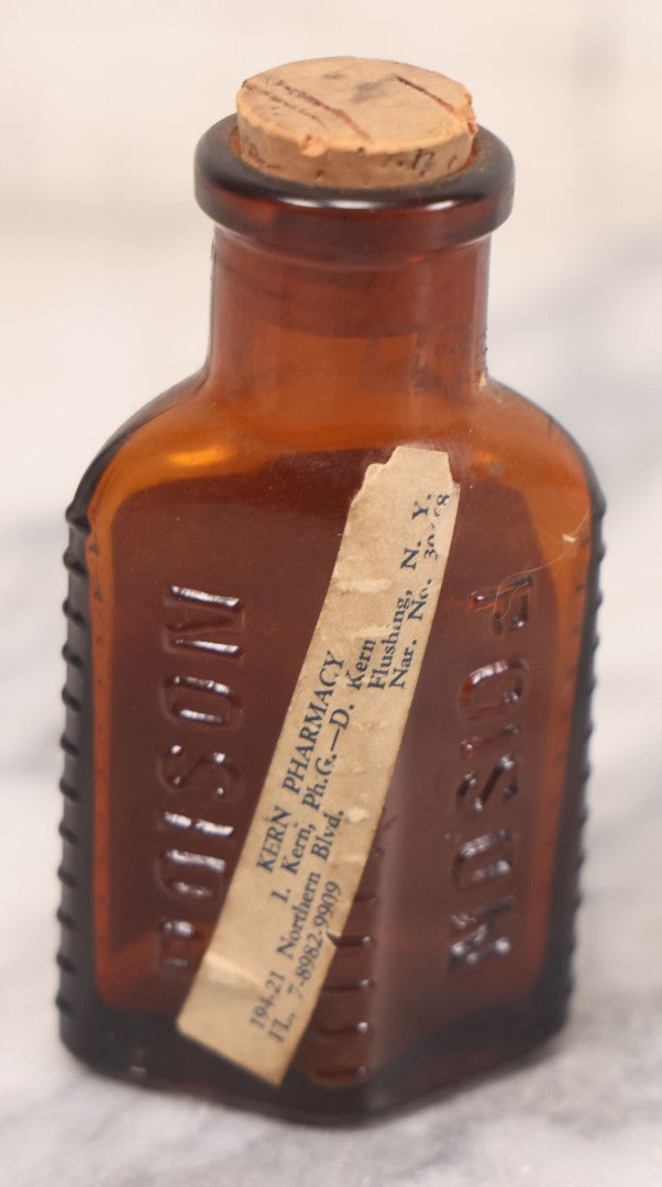 Lot 068 - Grouping Of Five Antique Amber Glass Poison Bottles With Horizontal Poison Ribs, Including Faded Eli Lilly & Co. Label And Kern Pharmacy Label, Flushing, New York, One With Eli Lilly & Co. Atropine Sulphate Label, And Three Without Labels