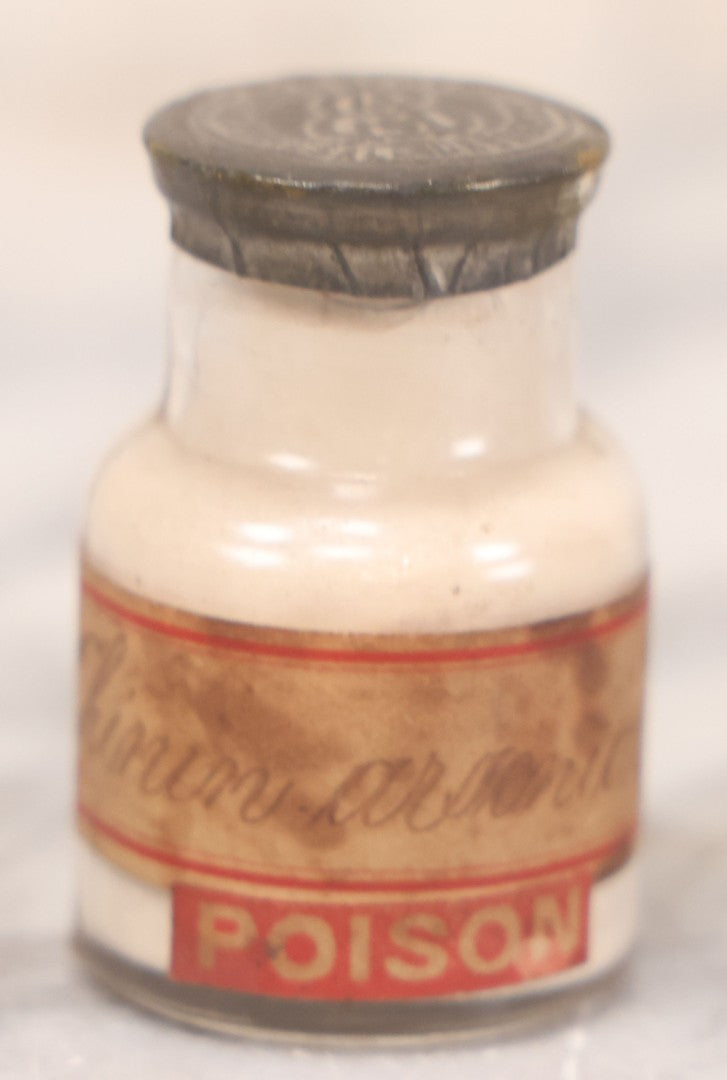 Lot 069 - Grouping Of Six Antique Poison Bottles Including Amber With Crosshatch Poison Ribs, Eli Lilly & Co. Diamond Antiseptics, Clear Chinum Arsenate With Eimer & Amend Lid, East Rock Pharmacy New Haven, And Liggett's Springfield, Ma