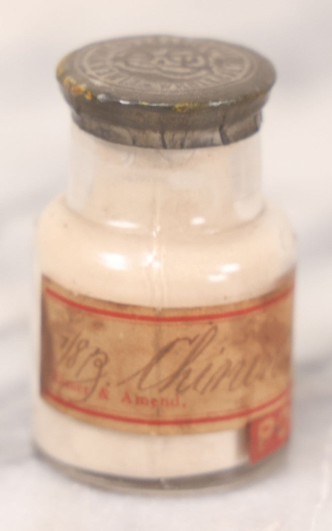 Lot 069 - Grouping Of Six Antique Poison Bottles Including Amber With Crosshatch Poison Ribs, Eli Lilly & Co. Diamond Antiseptics, Clear Chinum Arsenate With Eimer & Amend Lid, East Rock Pharmacy New Haven, And Liggett's Springfield, Ma