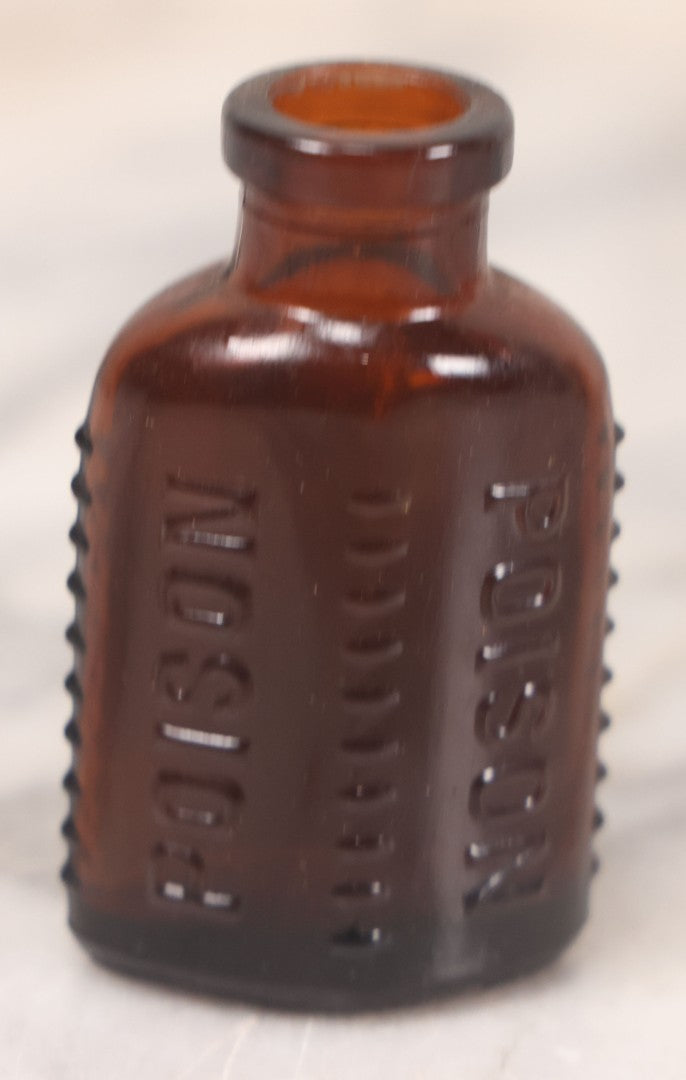 Lot 069 - Grouping Of Six Antique Poison Bottles Including Amber With Crosshatch Poison Ribs, Eli Lilly & Co. Diamond Antiseptics, Clear Chinum Arsenate With Eimer & Amend Lid, East Rock Pharmacy New Haven, And Liggett's Springfield, Ma