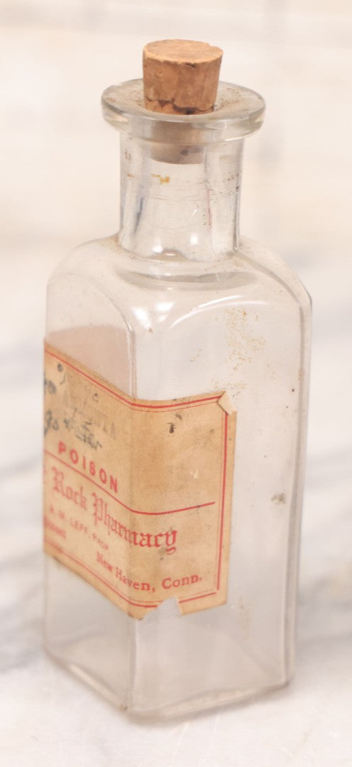 Lot 069 - Grouping Of Six Antique Poison Bottles Including Amber With Crosshatch Poison Ribs, Eli Lilly & Co. Diamond Antiseptics, Clear Chinum Arsenate With Eimer & Amend Lid, East Rock Pharmacy New Haven, And Liggett's Springfield, Ma