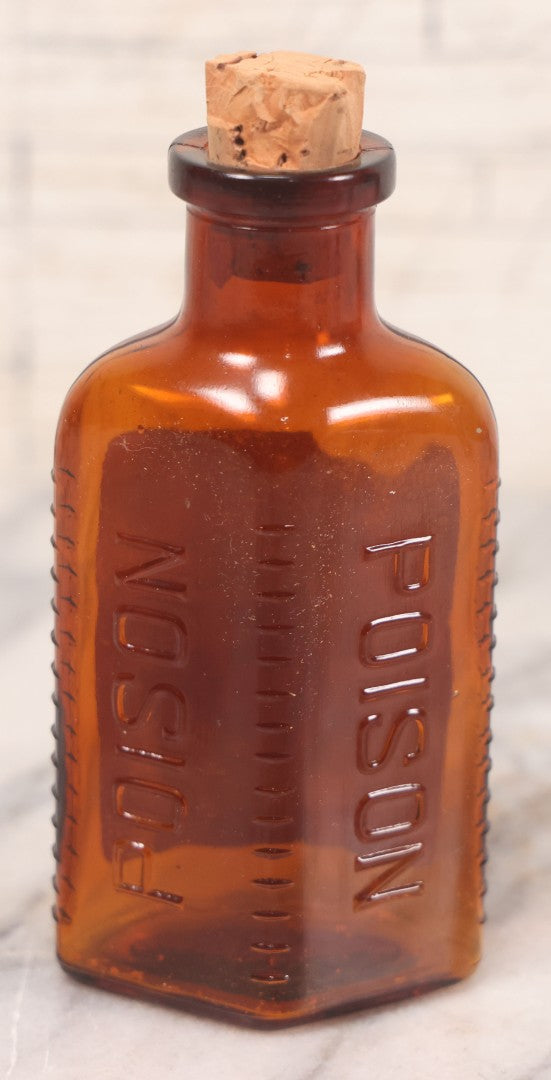 Lot 069 - Grouping Of Six Antique Poison Bottles Including Amber With Crosshatch Poison Ribs, Eli Lilly & Co. Diamond Antiseptics, Clear Chinum Arsenate With Eimer & Amend Lid, East Rock Pharmacy New Haven, And Liggett's Springfield, Ma