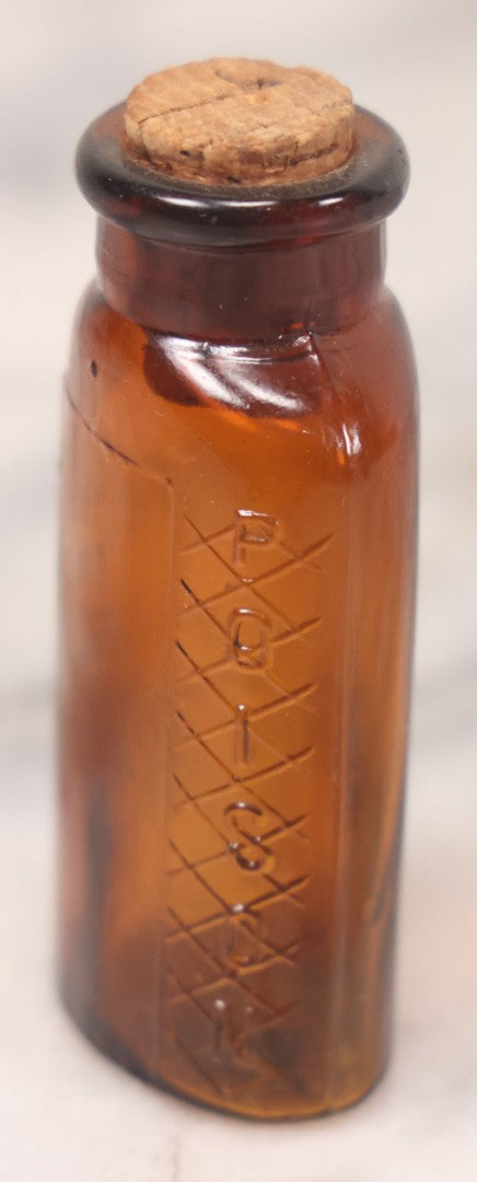 Lot 069 - Grouping Of Six Antique Poison Bottles Including Amber With Crosshatch Poison Ribs, Eli Lilly & Co. Diamond Antiseptics, Clear Chinum Arsenate With Eimer & Amend Lid, East Rock Pharmacy New Haven, And Liggett's Springfield, Ma