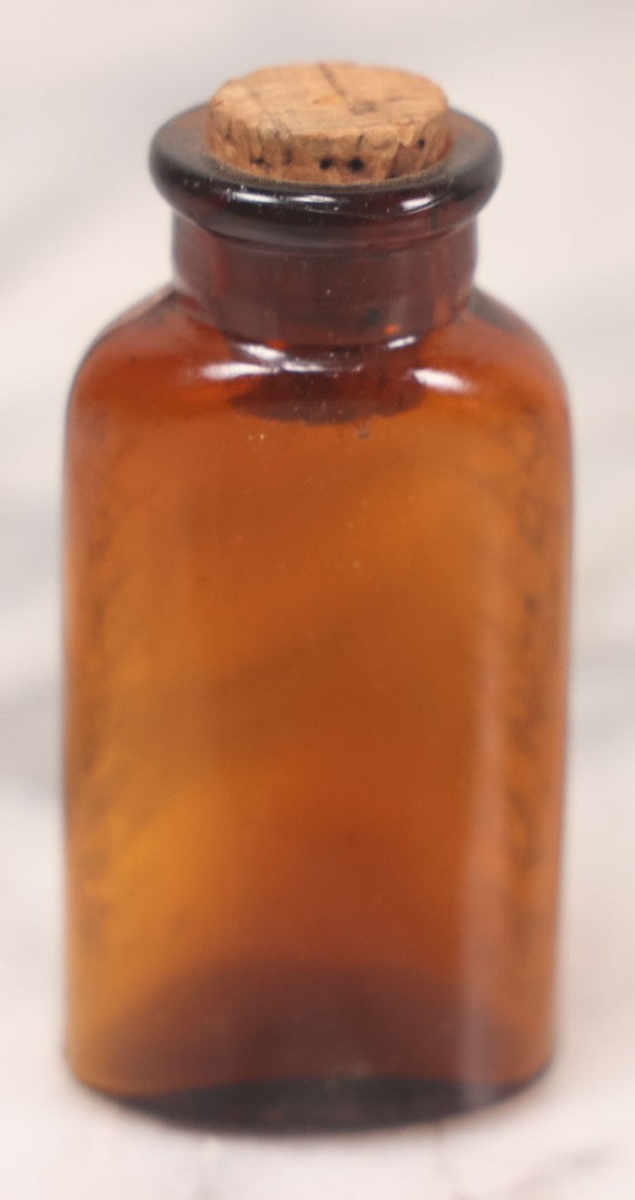 Lot 069 - Grouping Of Six Antique Poison Bottles Including Amber With Crosshatch Poison Ribs, Eli Lilly & Co. Diamond Antiseptics, Clear Chinum Arsenate With Eimer & Amend Lid, East Rock Pharmacy New Haven, And Liggett's Springfield, Ma