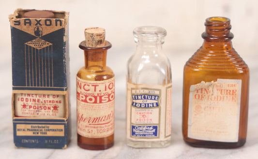 Lot 070 - Grouping Of Four Vintage Tincture Of Iodine Poison Bottles Including Saxon Brand In Partial Box, Rexall, Certified Pharmacal Co. Inc. New York, And Opperman's Drug Store, Torrington, Connecticut