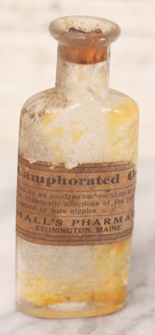 Lot 071 - Grouping Of Six Antique And Vintage Bottles Including Camphorated Oil From Small's Pharmacy, Stonington, Maine, Oil Of Bergamot From Bixby & Co., Montpelier, Vermont, Wright Blood Stain From Hartman Leddon Co., Philadelphia, And Others