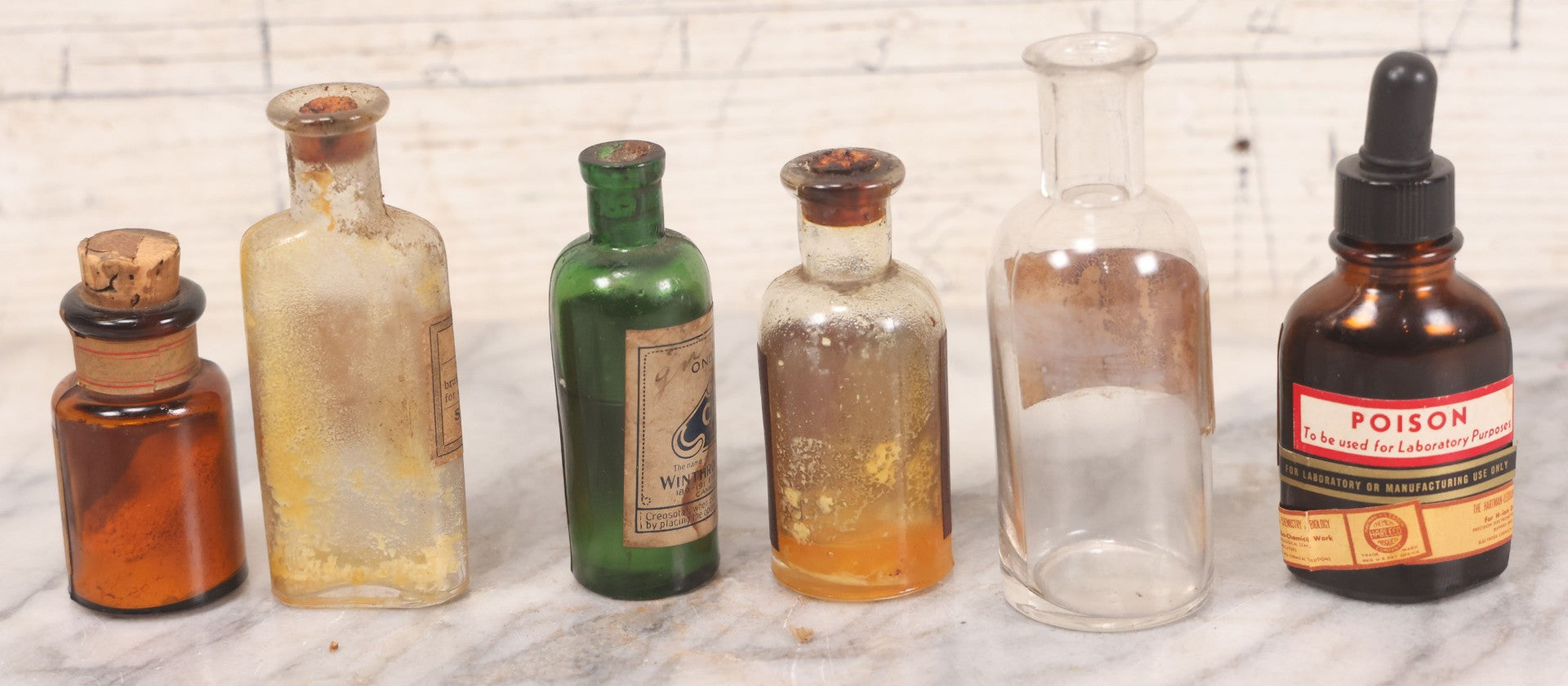 Lot 071 - Grouping Of Six Antique And Vintage Bottles Including Camphorated Oil From Small's Pharmacy, Stonington, Maine, Oil Of Bergamot From Bixby & Co., Montpelier, Vermont, Wright Blood Stain From Hartman Leddon Co., Philadelphia, And Others