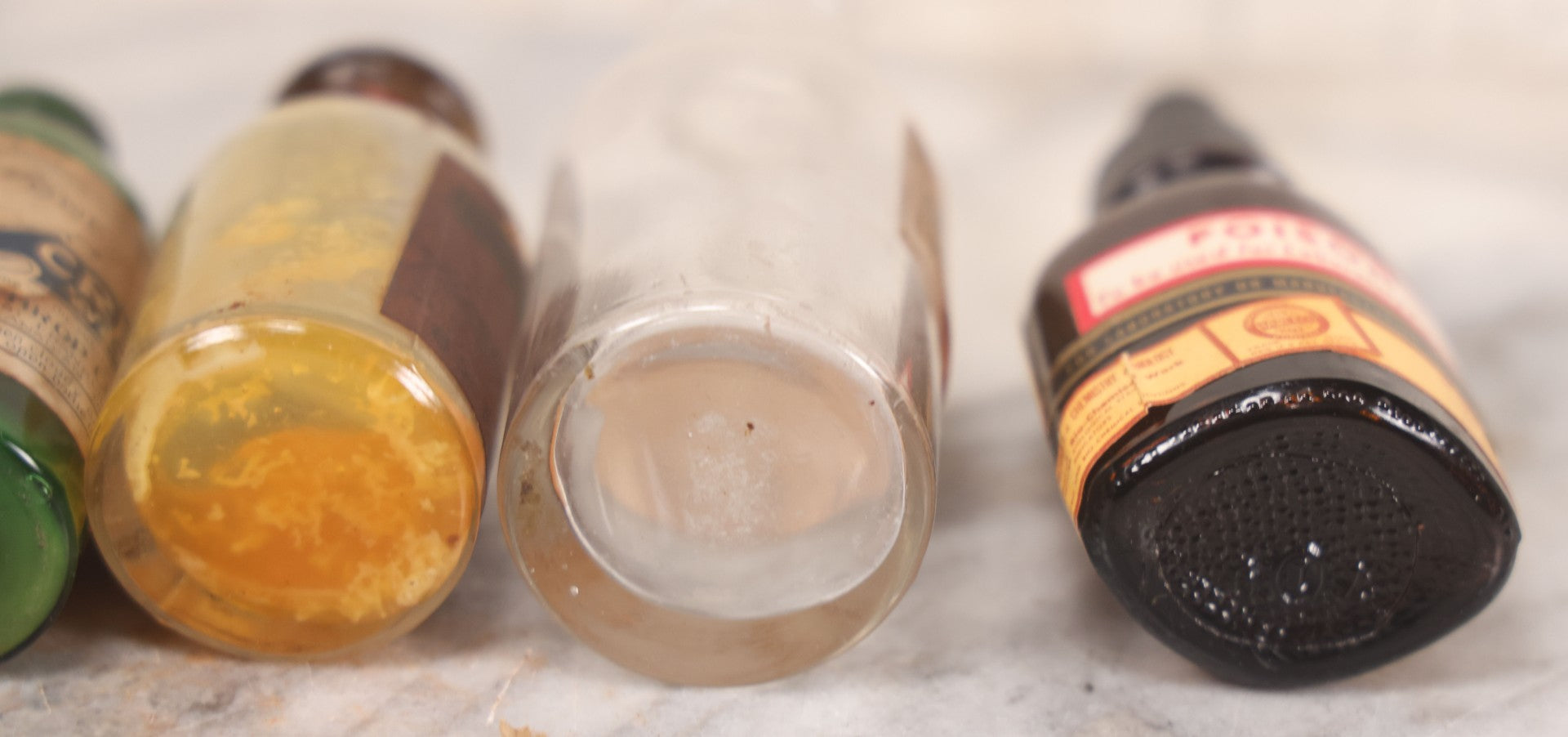 Lot 071 - Grouping Of Six Antique And Vintage Bottles Including Camphorated Oil From Small's Pharmacy, Stonington, Maine, Oil Of Bergamot From Bixby & Co., Montpelier, Vermont, Wright Blood Stain From Hartman Leddon Co., Philadelphia, And Others