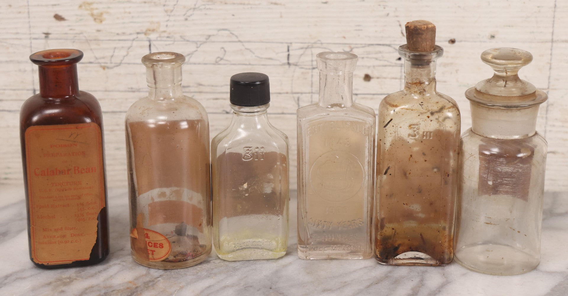 Lot 072 - Grouping Of Six Antique Bottles Including Donovan's Solution From Gilman Brother Inc., Boston, Mercury Chalk From James E. Signorelli, Everett, Massachusetts, Calabar Bean Extract From John Wyeth & Brother, Philadelphia, And Others