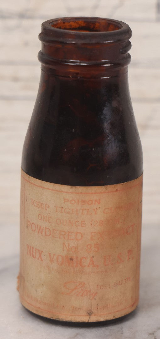 Lot 073 - Grouping Of Five Antique Bottles With Paper Labels Including Witch Hazel, John Laws, Columbus M.S., Spirit Of Peppermint, Koch's Pharm., Greenwich, R.I., Potassium Metabisulphate, Kodak, Mercury, Guterman Dental, N.Y., & Nux Vomica