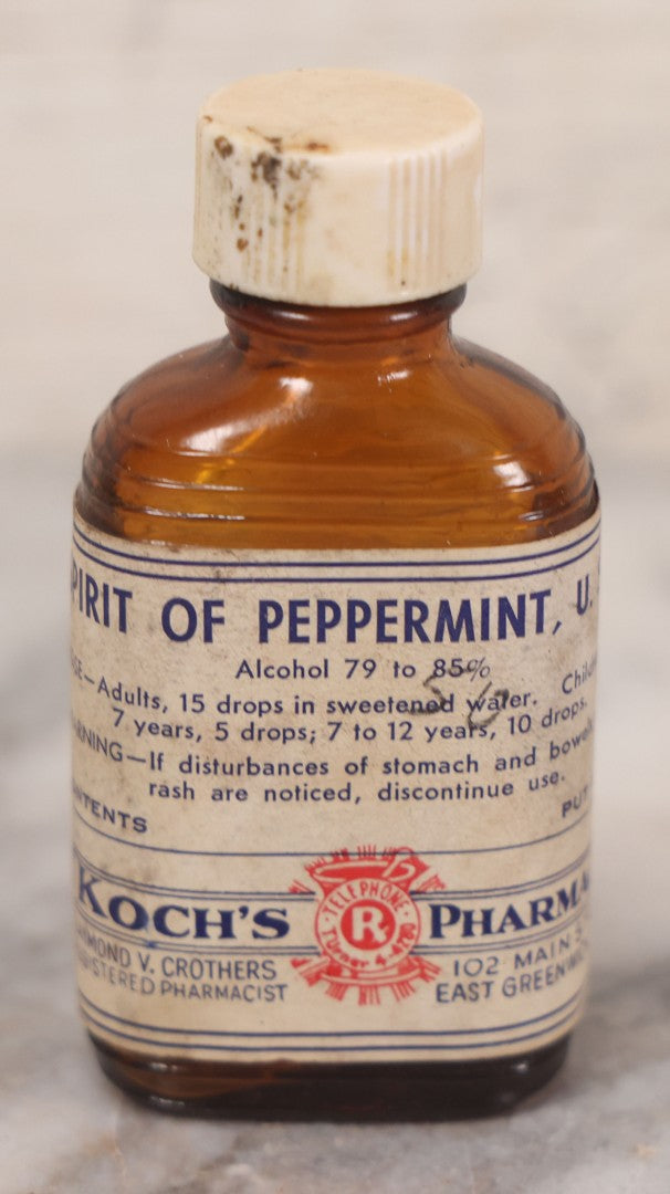 Lot 073 - Grouping Of Five Antique Bottles With Paper Labels Including Witch Hazel, John Laws, Columbus M.S., Spirit Of Peppermint, Koch's Pharm., Greenwich, R.I., Potassium Metabisulphate, Kodak, Mercury, Guterman Dental, N.Y., & Nux Vomica